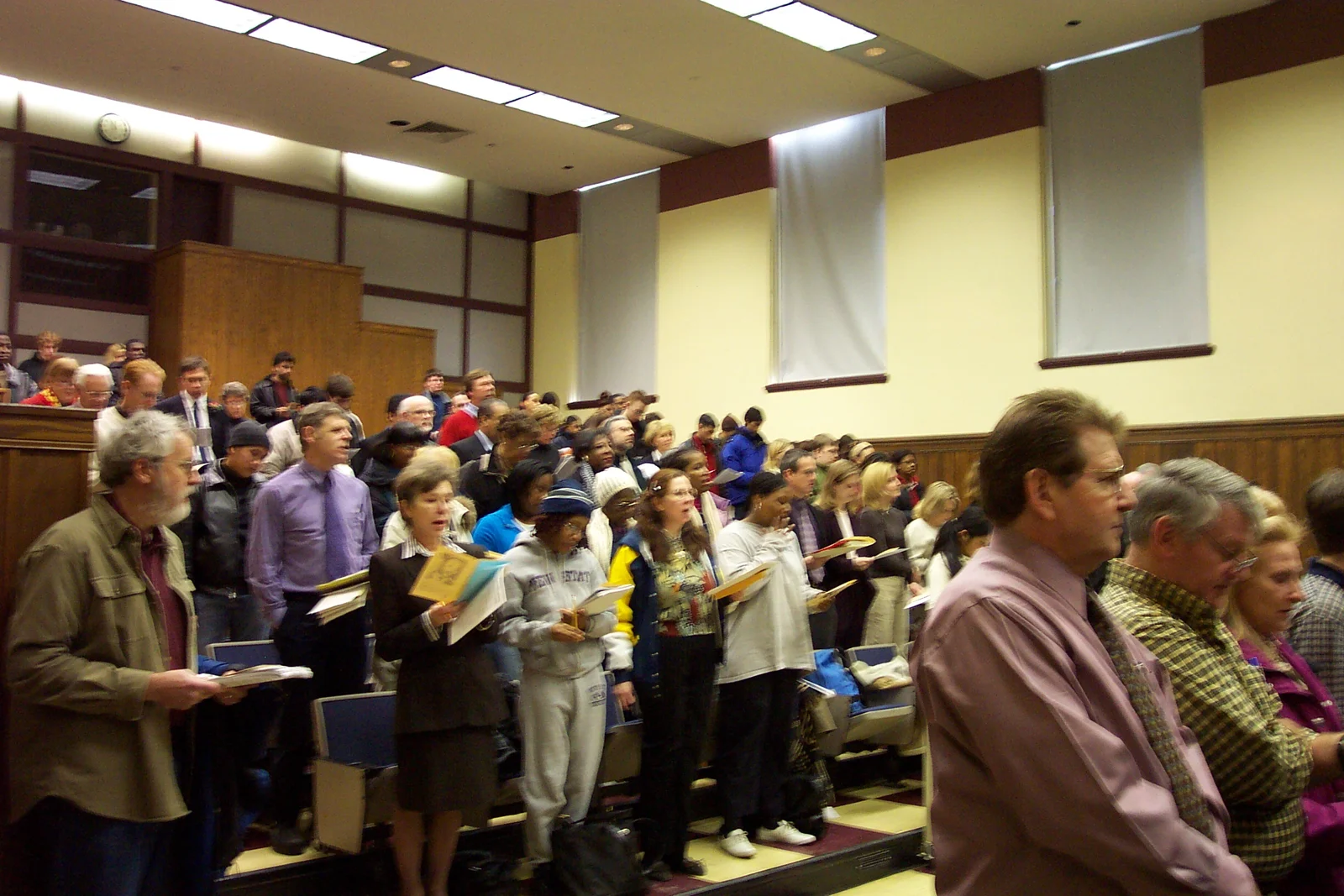 As The Star Spangled Banner was played, community members stood respectfully.