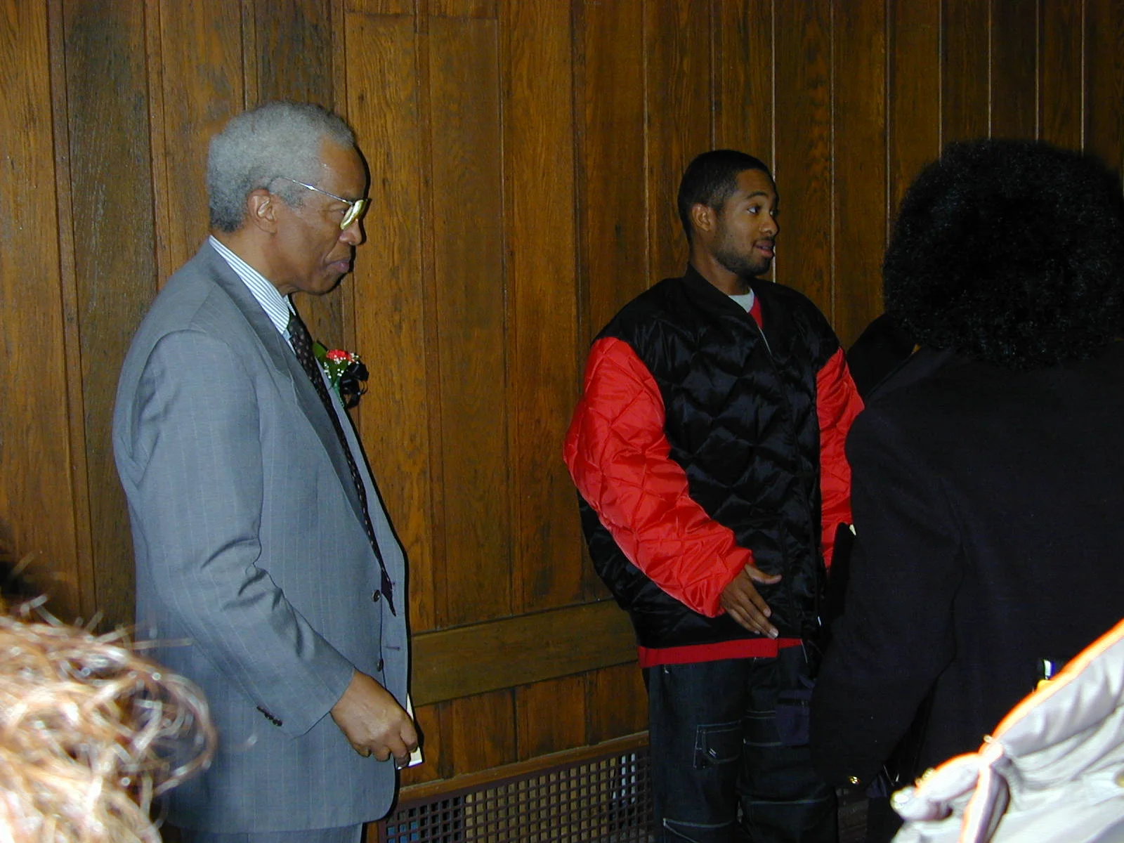 Before the ceremony began, Dr. Bluford spoke with students,... 