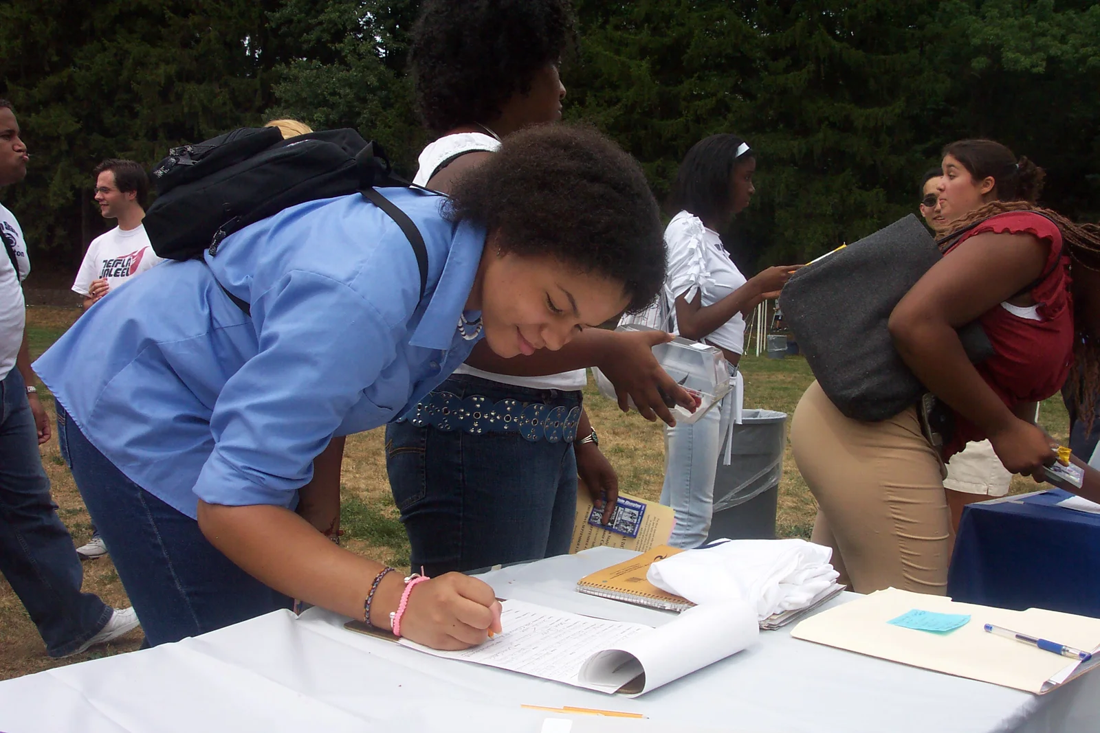 Danielle Taylor signs up for a club.