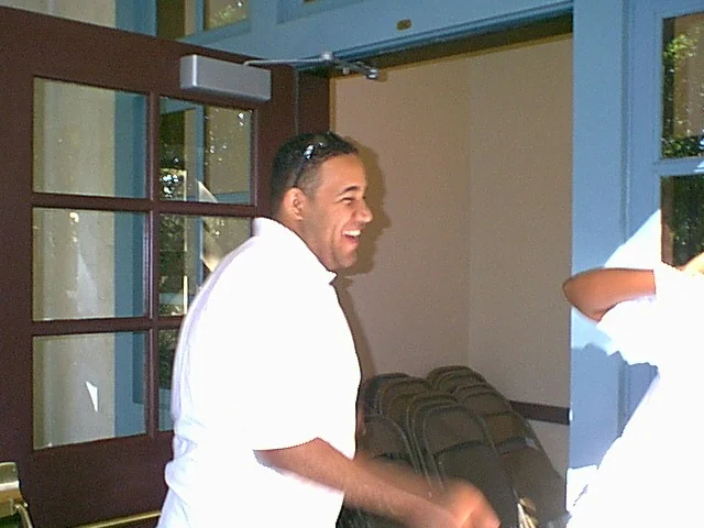 Luiz Ruiz-Alomar enters the Sutherland auditorium. 