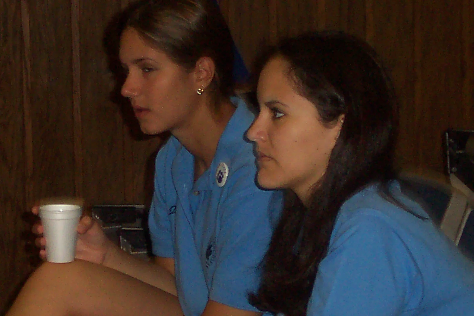 Jenna Backer and Christina drink coffee while waiting for the day to begin. 