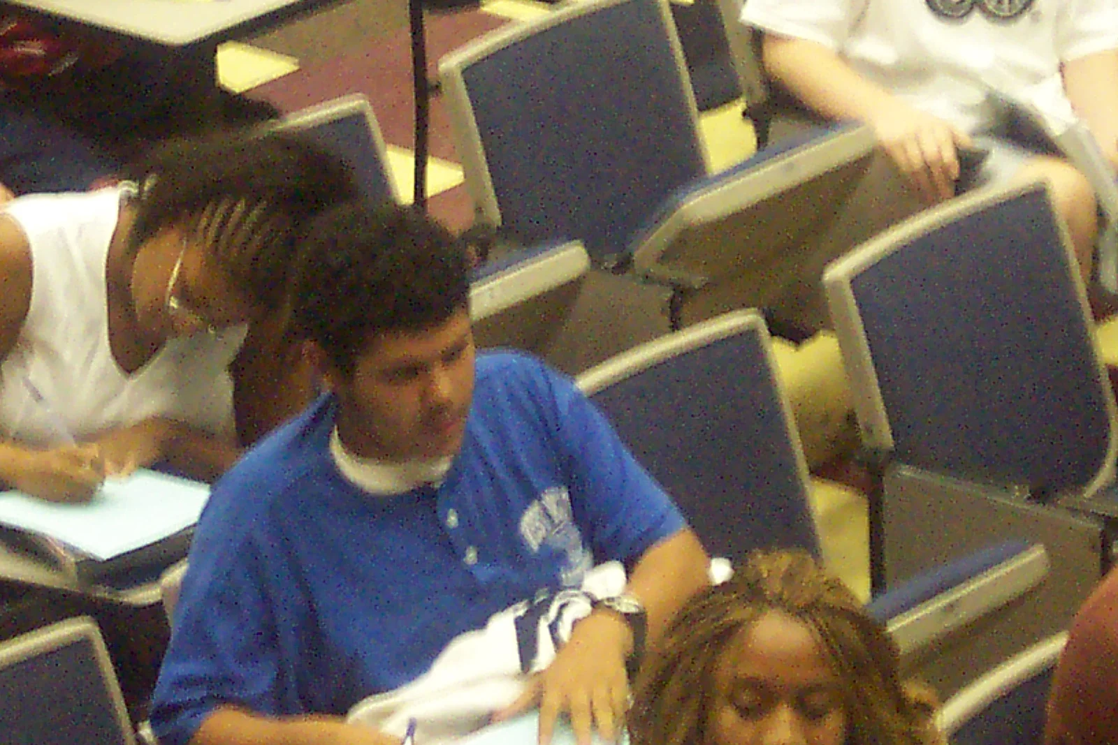 Students fill out evaluations as the day draws to a close. 