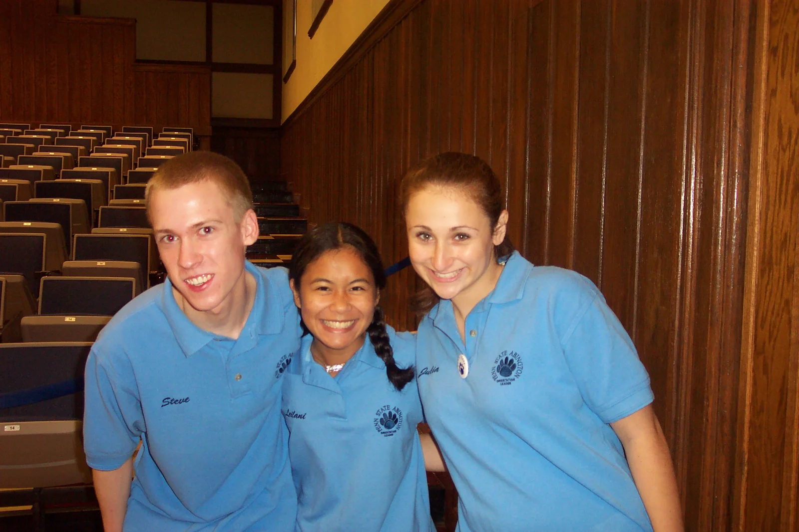 Steve Sokolowski, Leilani Tesoro, and Julia Cheskis take a break from greeting incoming students. 