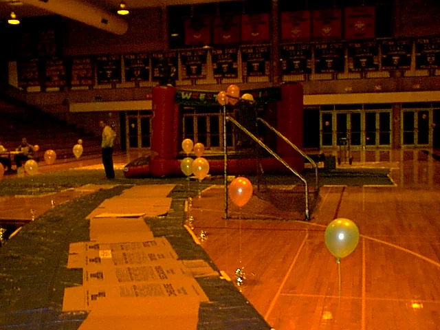 The runway up to the pudding wrestling ring is lined with cardboard, plastic, and balloons before the event.