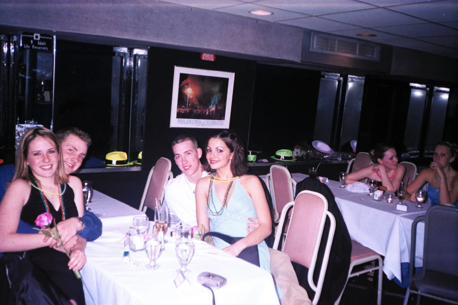 Another picture of some Abington students relaxing at a table.