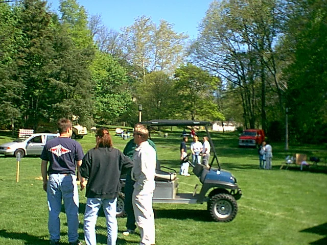 Three maintenence workers chat while the day goes on.