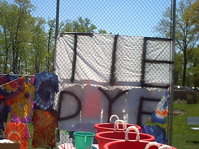 The tie dye sign was used not only in the 2002 Spring Fling, but also in the 2003 event.