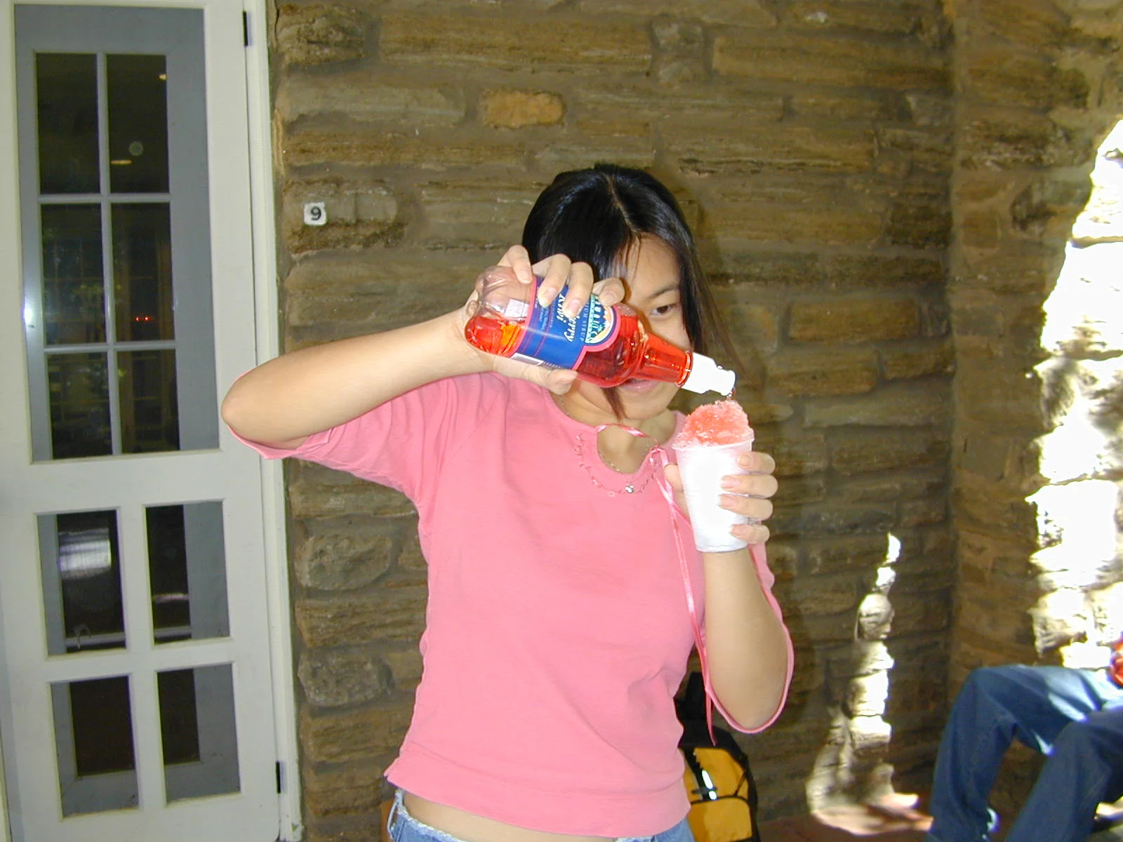 This woman happily poured on the syrup.