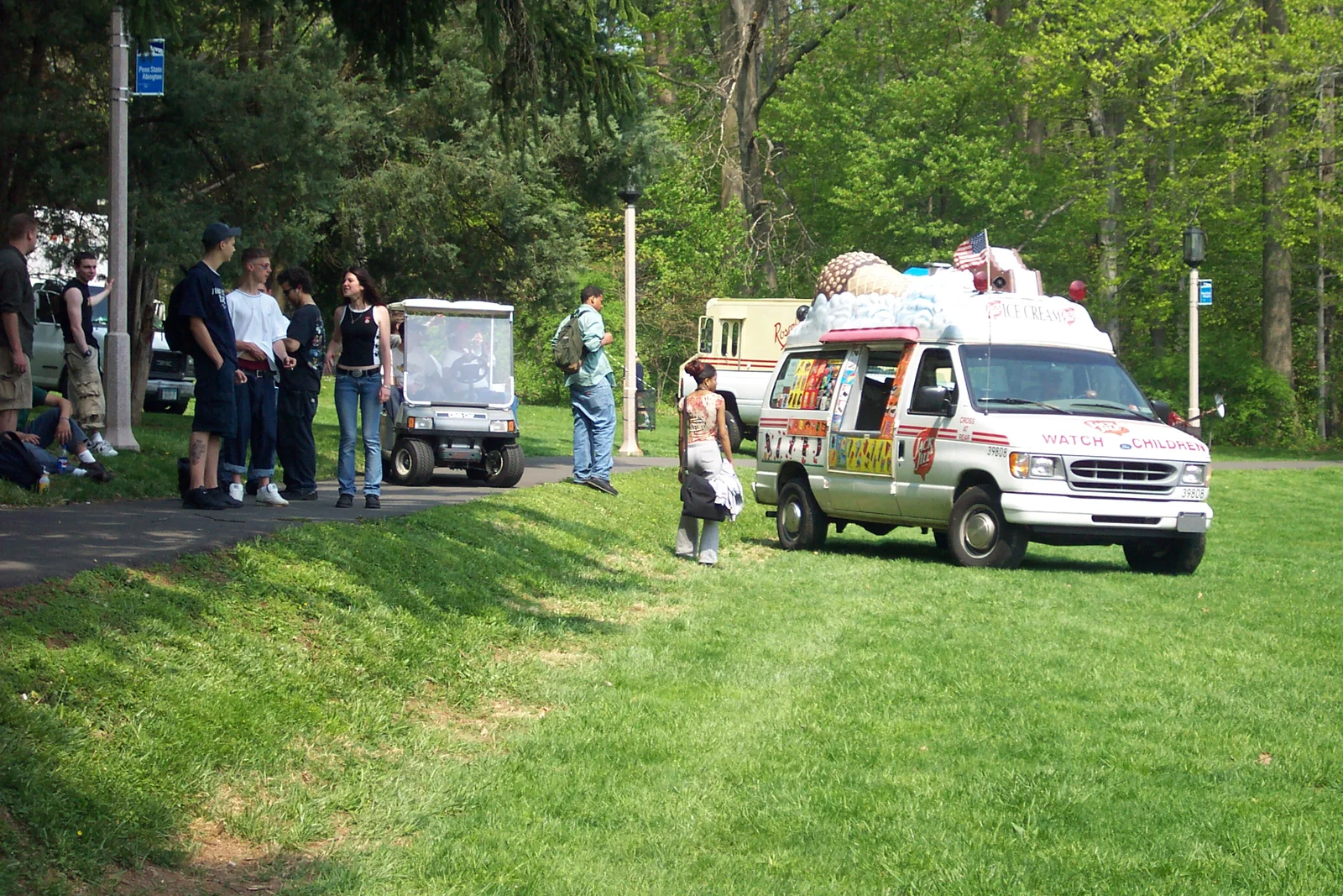 This ice cream truck was almost ready to overturn before maintenence workers safely moved it down onto the field as seen here.