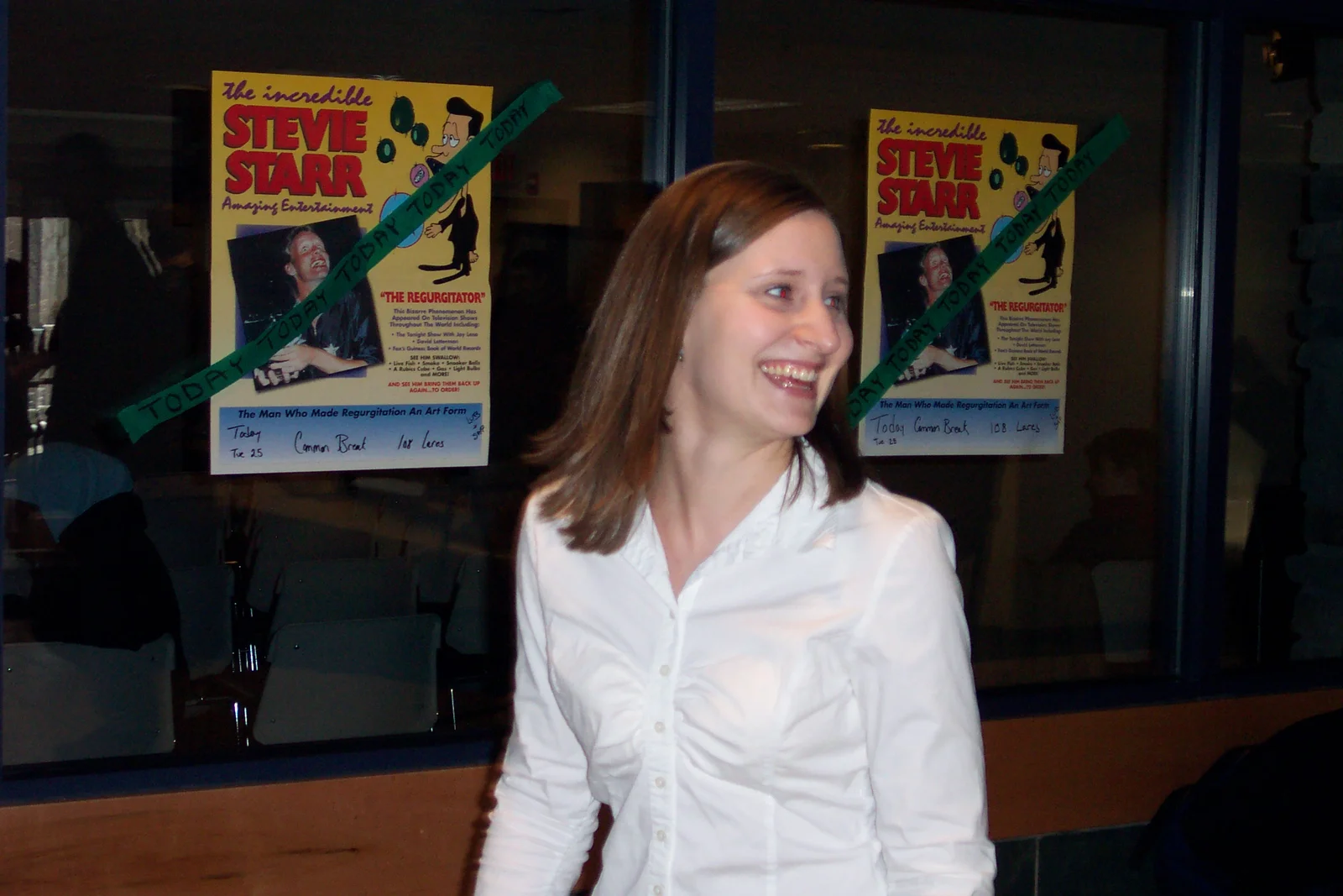 Kelly Palmer attempts to hide from the camera.
