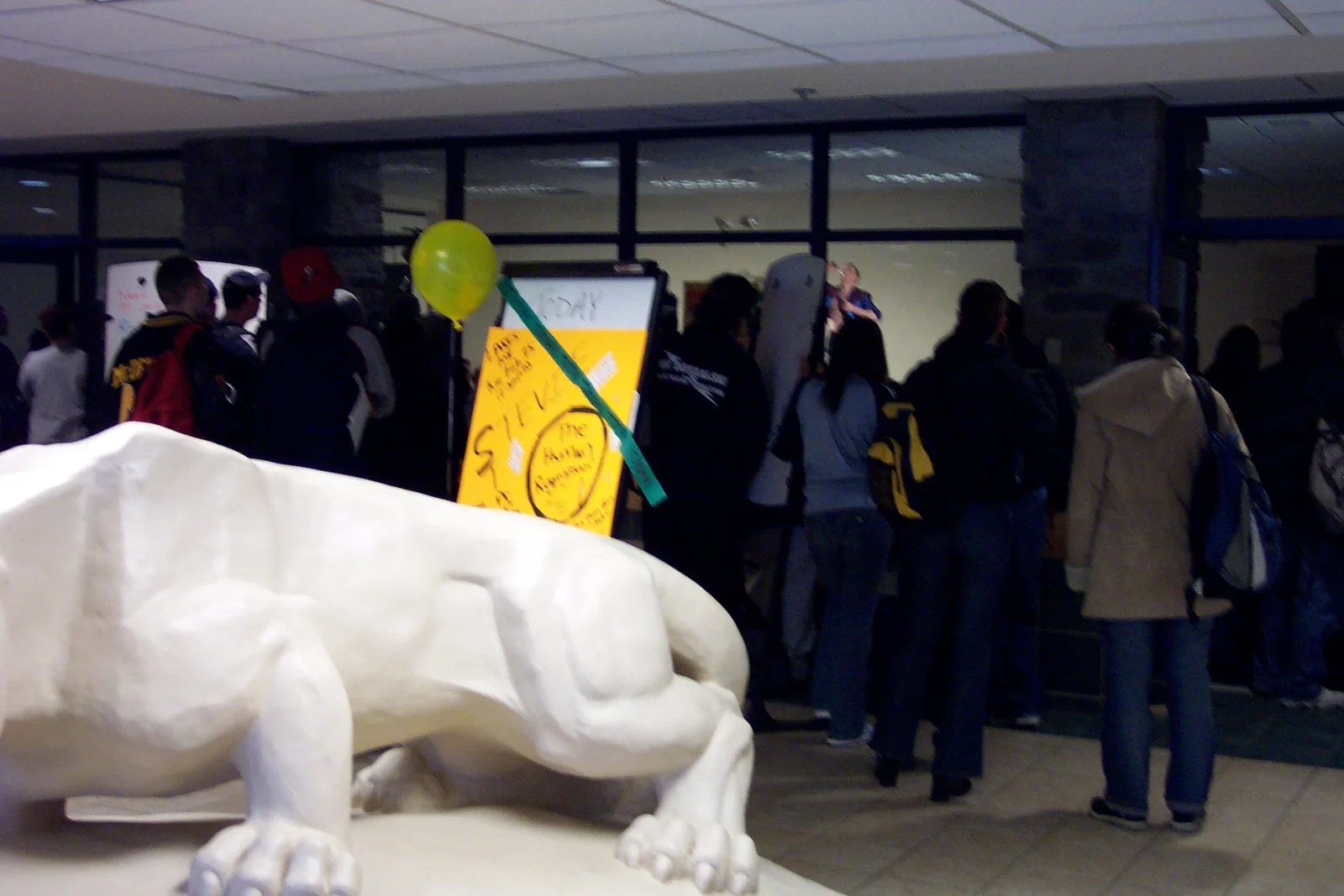 So many people wanted to watch the event that they crammed around the Lion outside room 108. 
