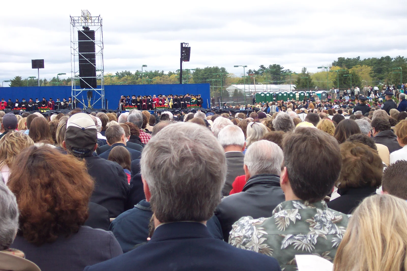 The upper center of this picture features the professors decked out in their academic regalia.