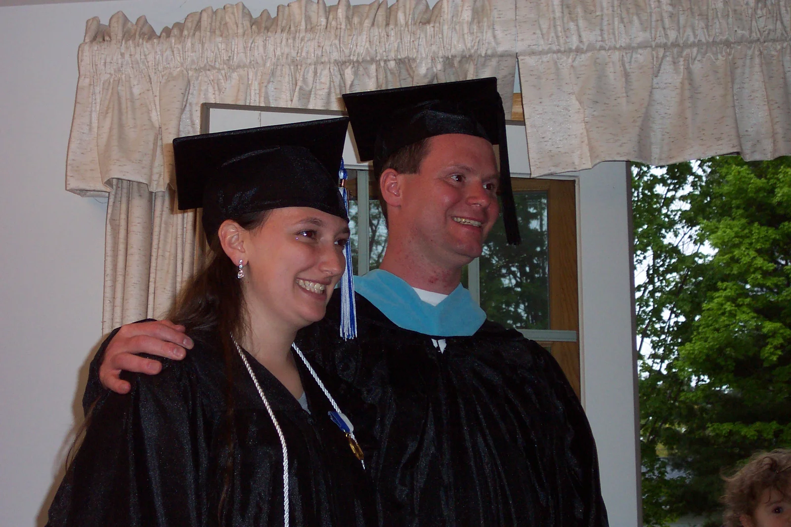 The graduates posed while upwards of thirty photos were taken of various combinations of relatives.