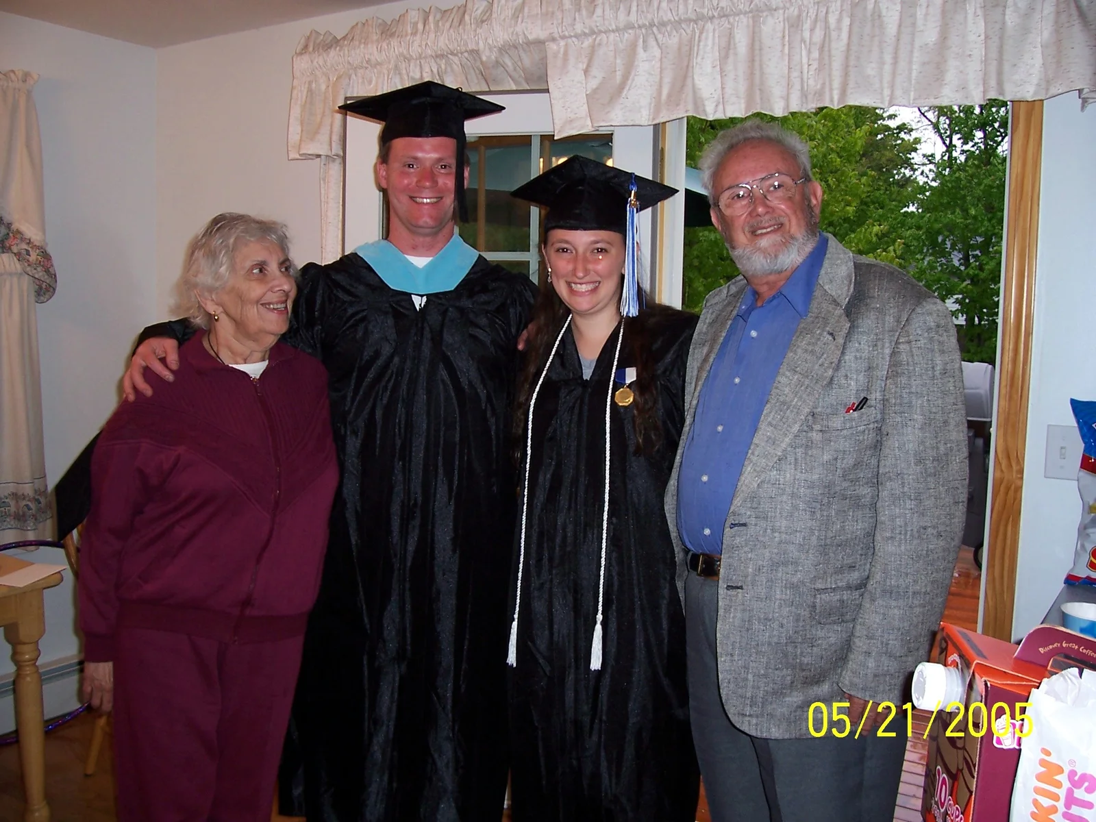Another picture of Sarah and her grandparents, this time with Eric.