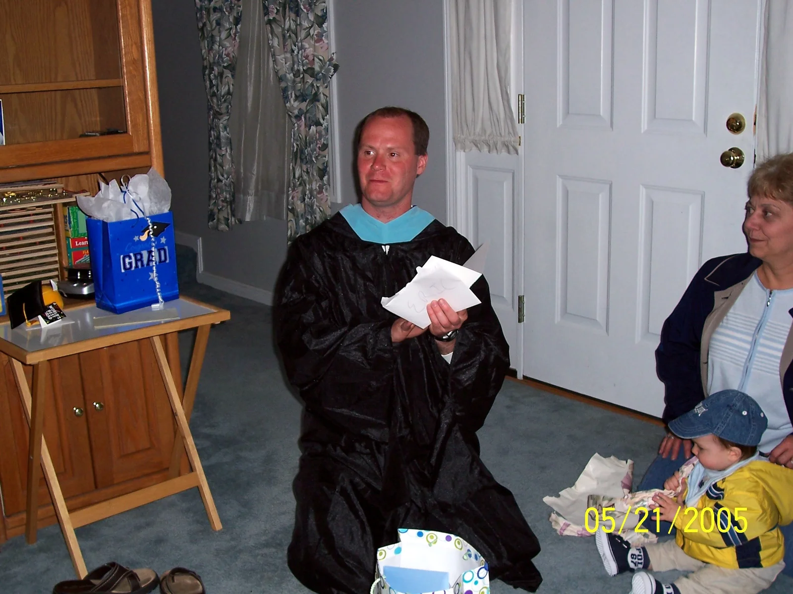 Despite being 30 years old, Eric gleefully opens presents as if he were just 4. 