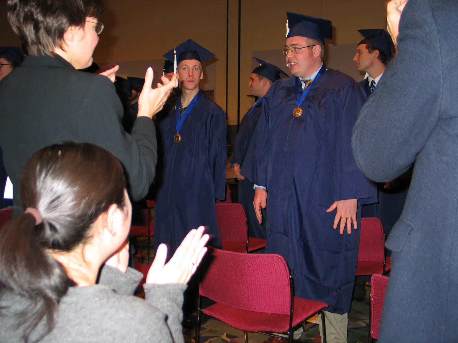 Next, it was the parents' and spouses' turn to stand and recognize the scholars' achievements.