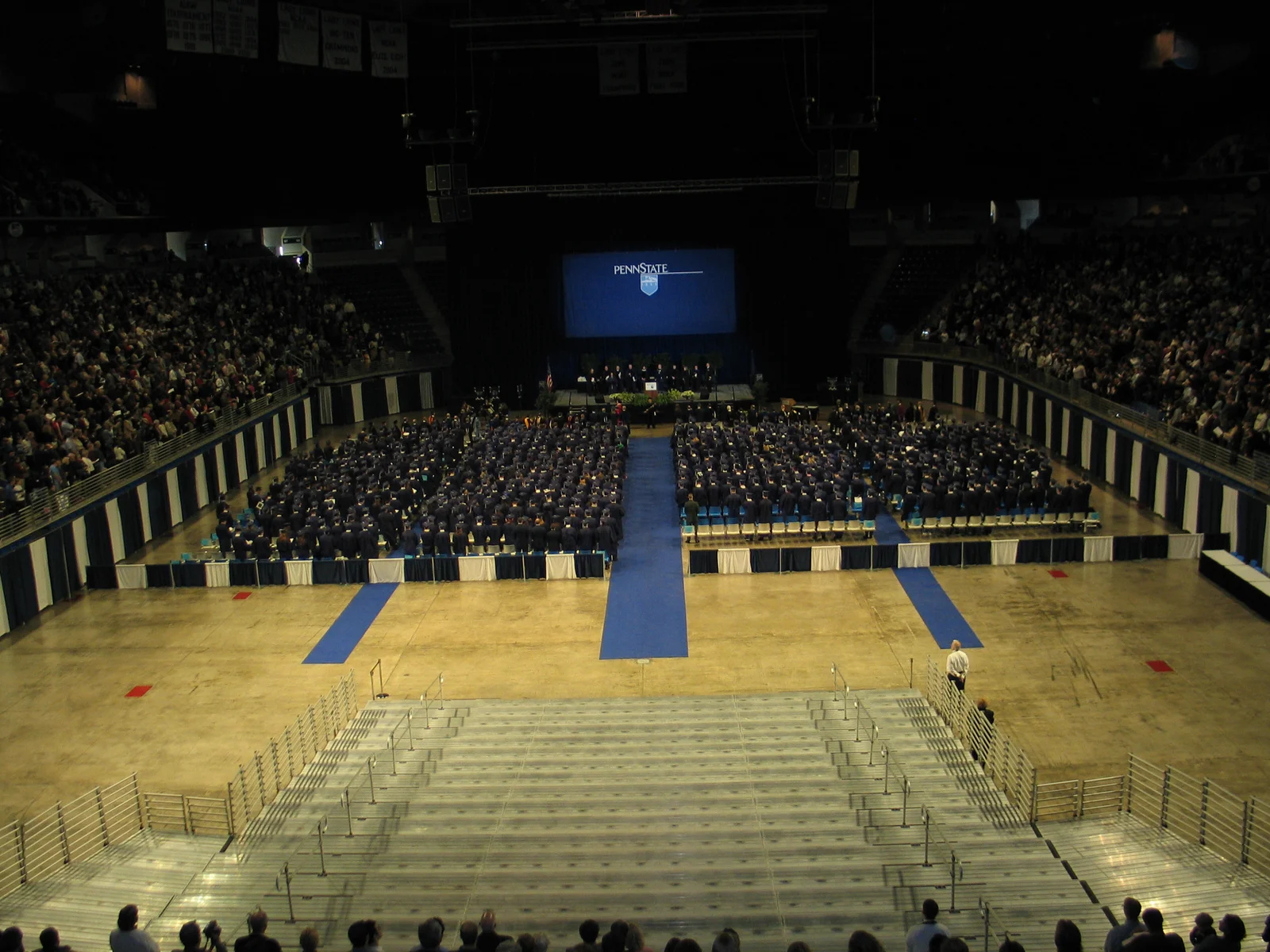 Much fanfare was made about the Penn State Alumni Association, and here a speaker inducts everyone into the Association. Penn State has awarded over one half-million degrees.