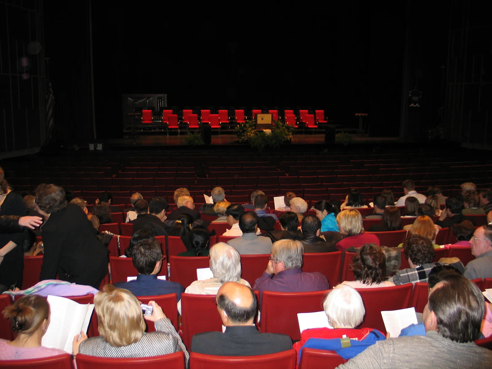 At the beginning of the ceremony, the stage stood empty for the platform party in advance of the procession.