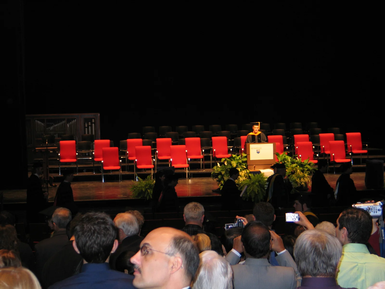 The ceremony began as a faculty member instructed everyone to stand.