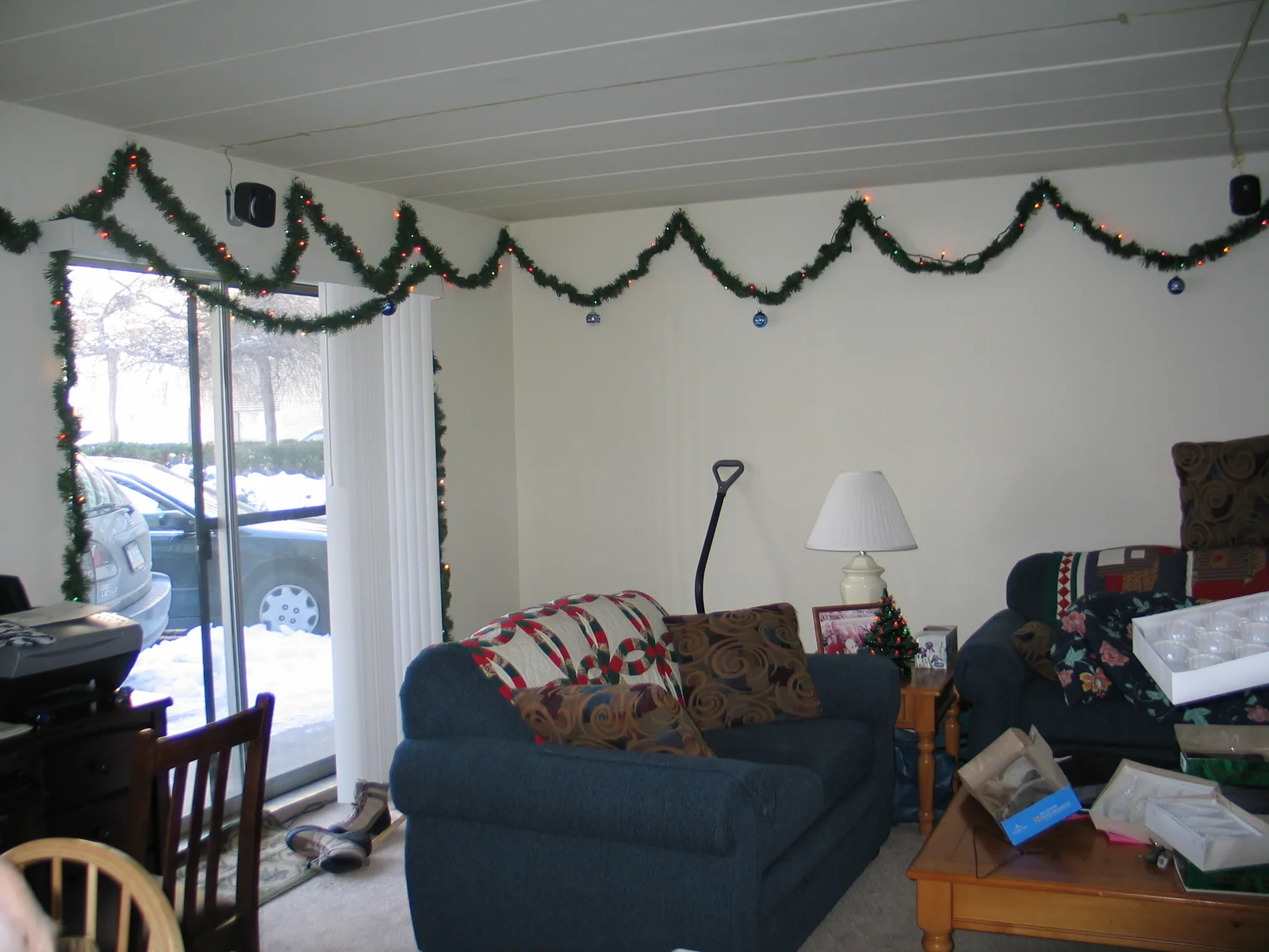 The foot of snow that covered the ground is clearly visible out the back door.