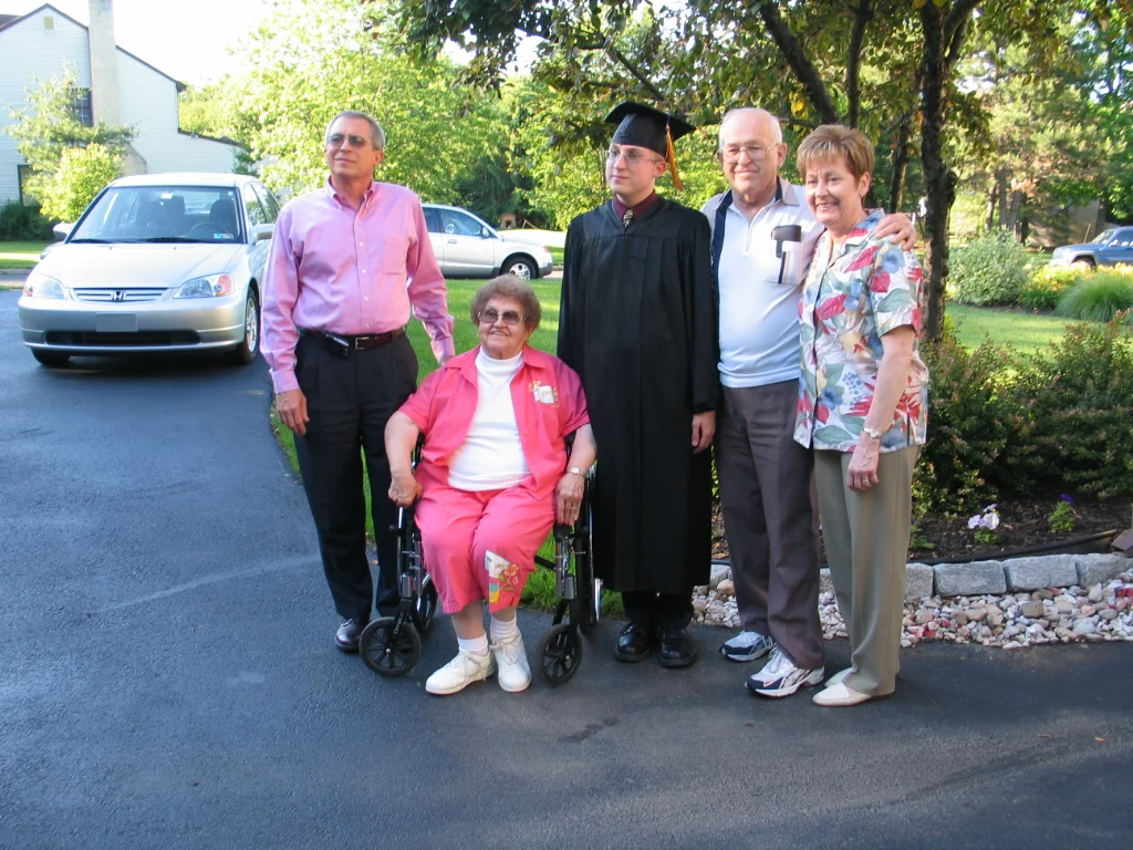 Here, Chris poses with both his parents and grandparents.  Shortly after, Tony Hoffman would also wish his congratulations. 