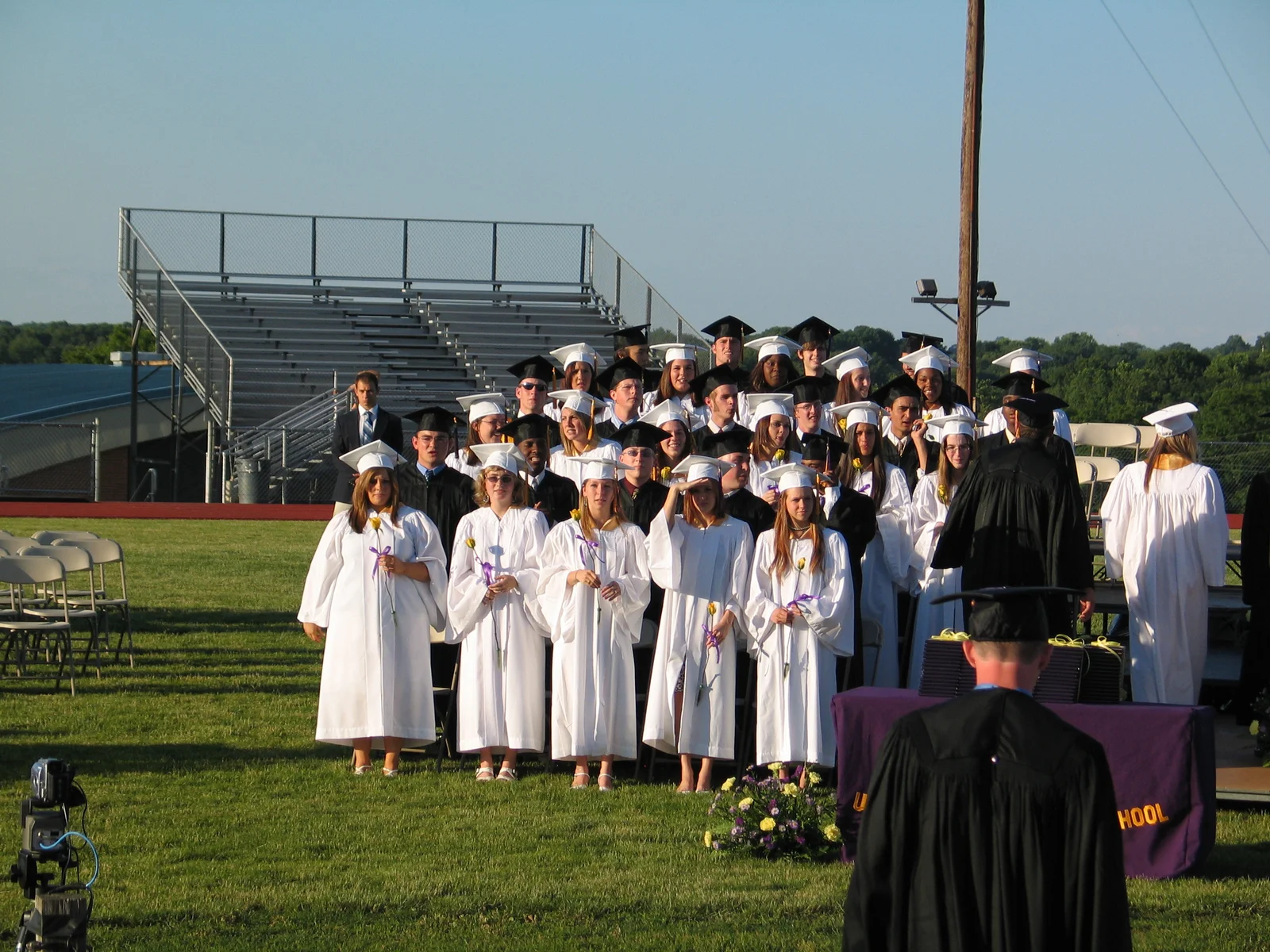 graduates caps gowns tassels 