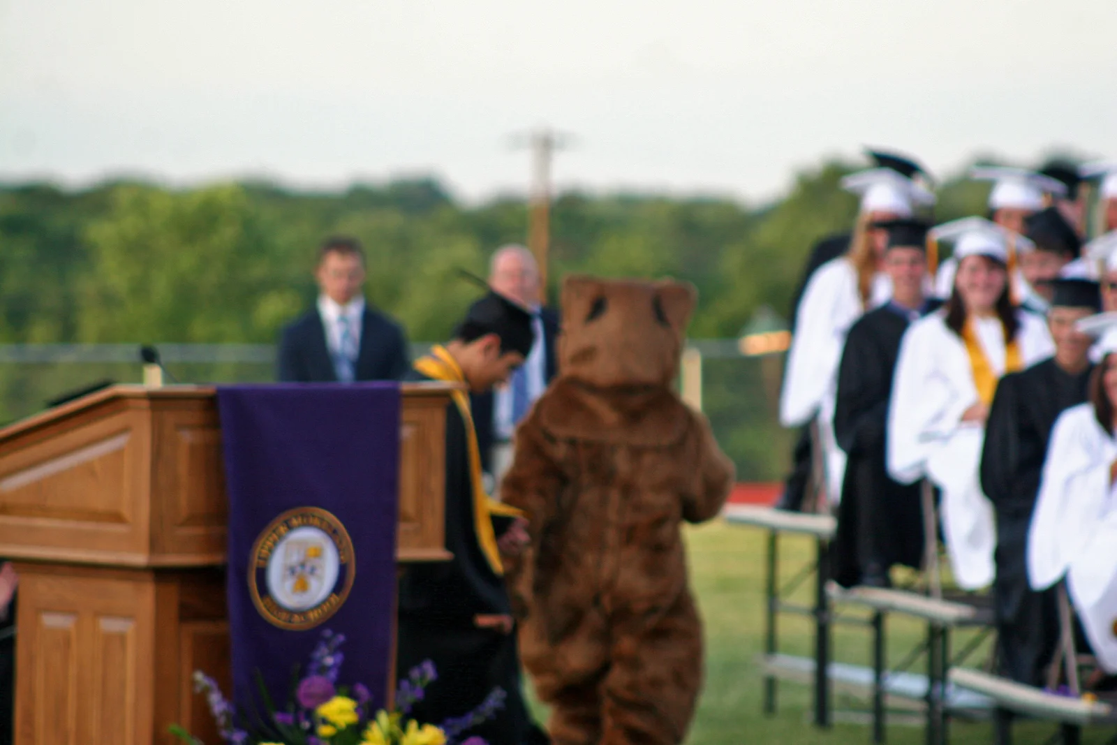 The class gift was a new bear costume, which someone wore to show off the outfit. 