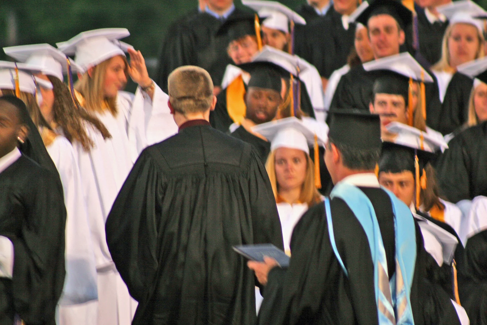Chris was relieved to be finished after the degree was handed to him. 