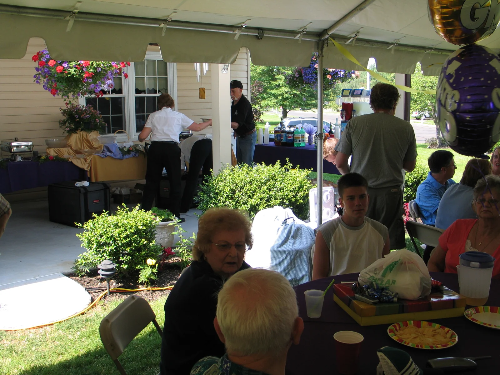 The servers prepared the feast that was to follow. While the chicken caccitore was well-received, several guests complained about the roast beef.