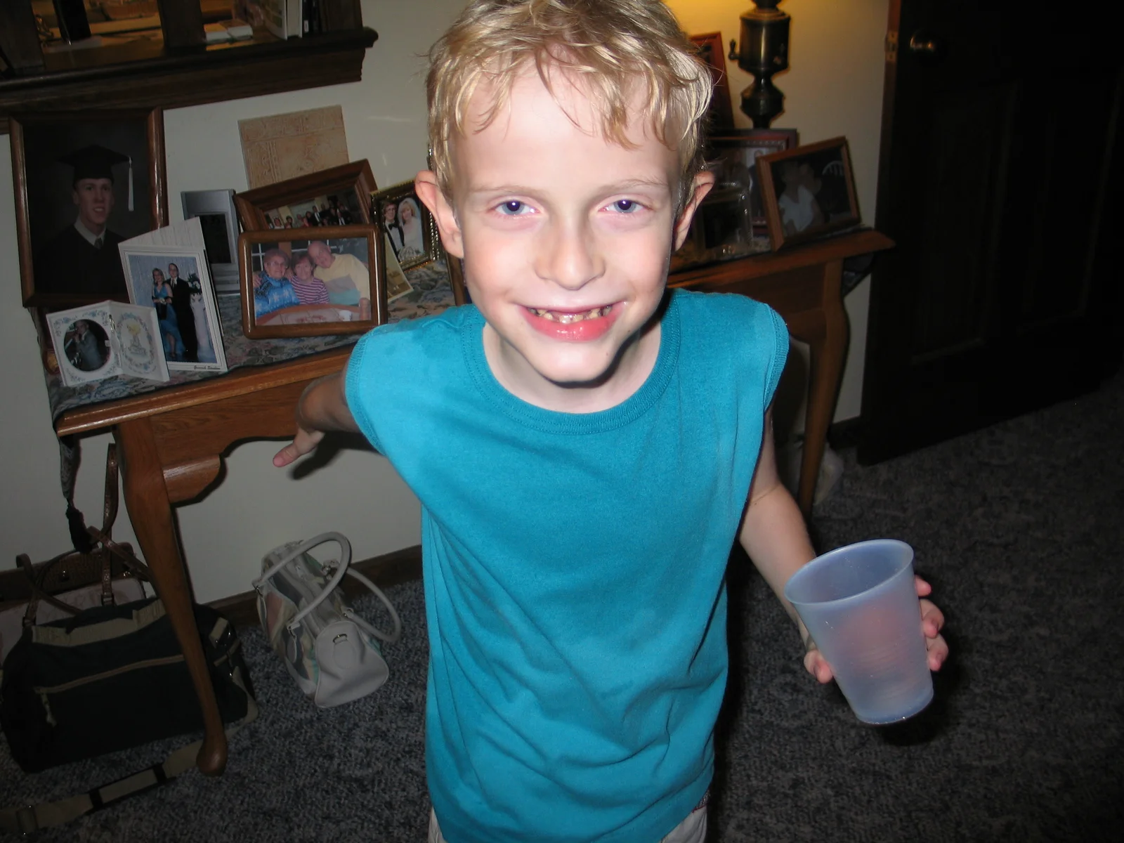 Colin Spiecker puts on a dreadful face here while holding a cup of water. 