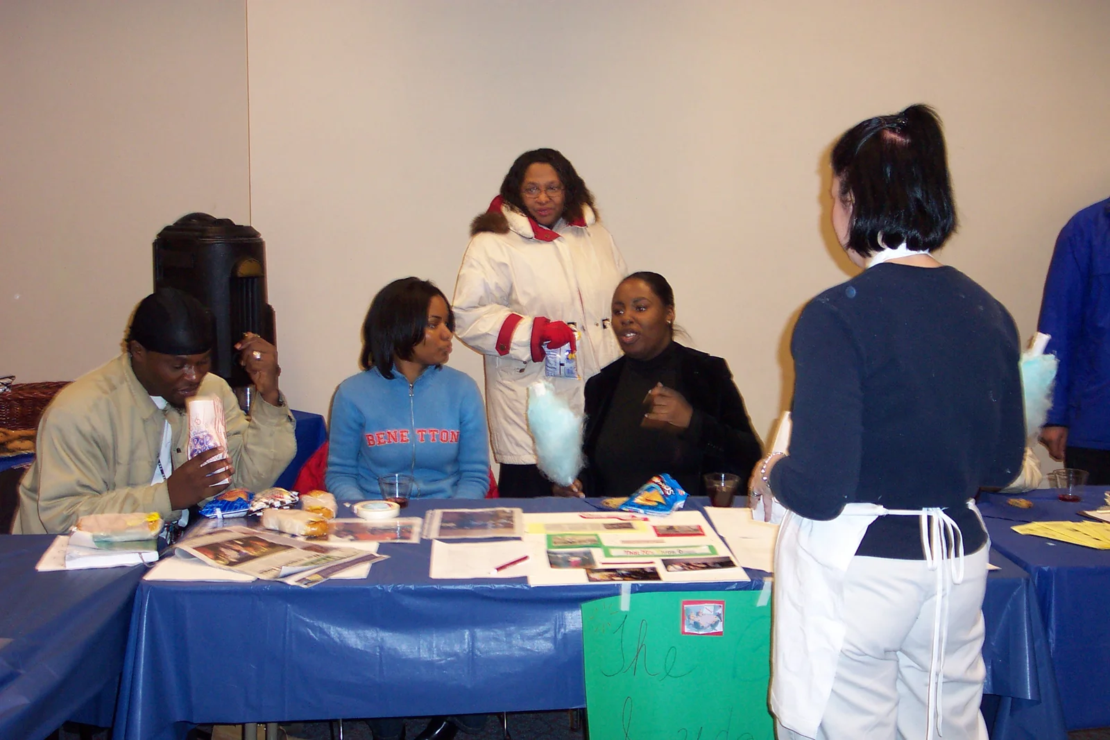 Ms. Yvonne Thompson and Tracy McClintic chat at the Black Student Union table. 