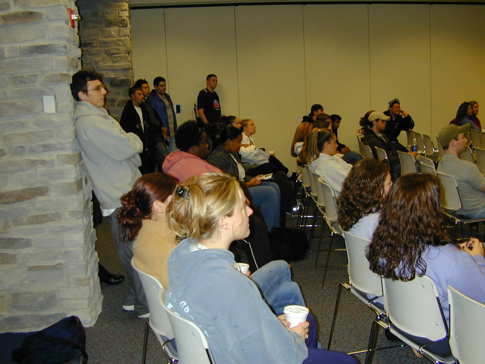 Soroosh Hashemi and others looked on as the guests spoke. 