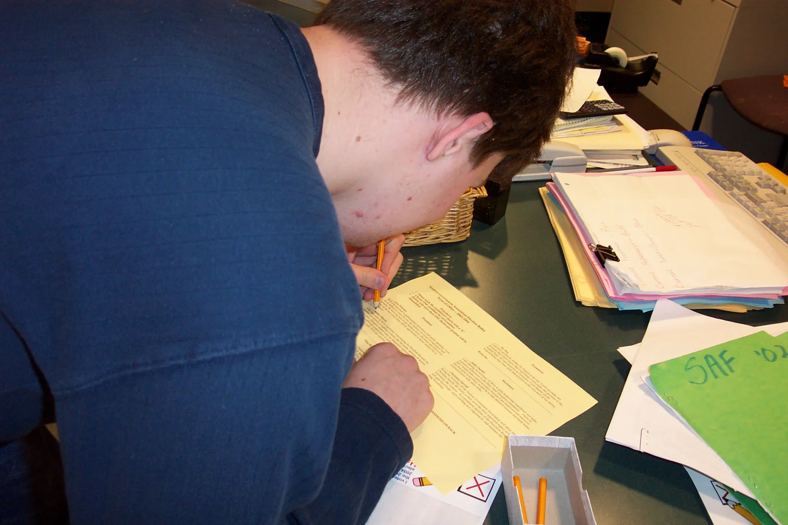Matt Cinquino, a sophomore, fills out a ballot. 