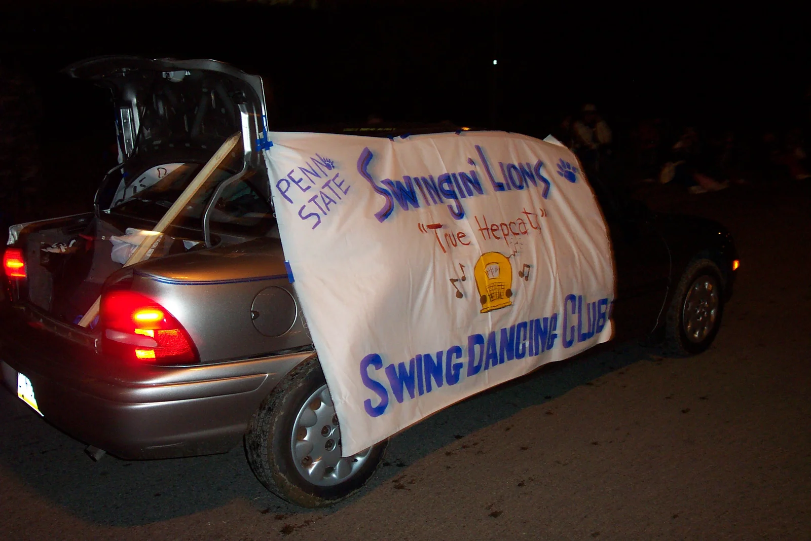 The "Swinging Lions" banner proudly advertises the club's interest.