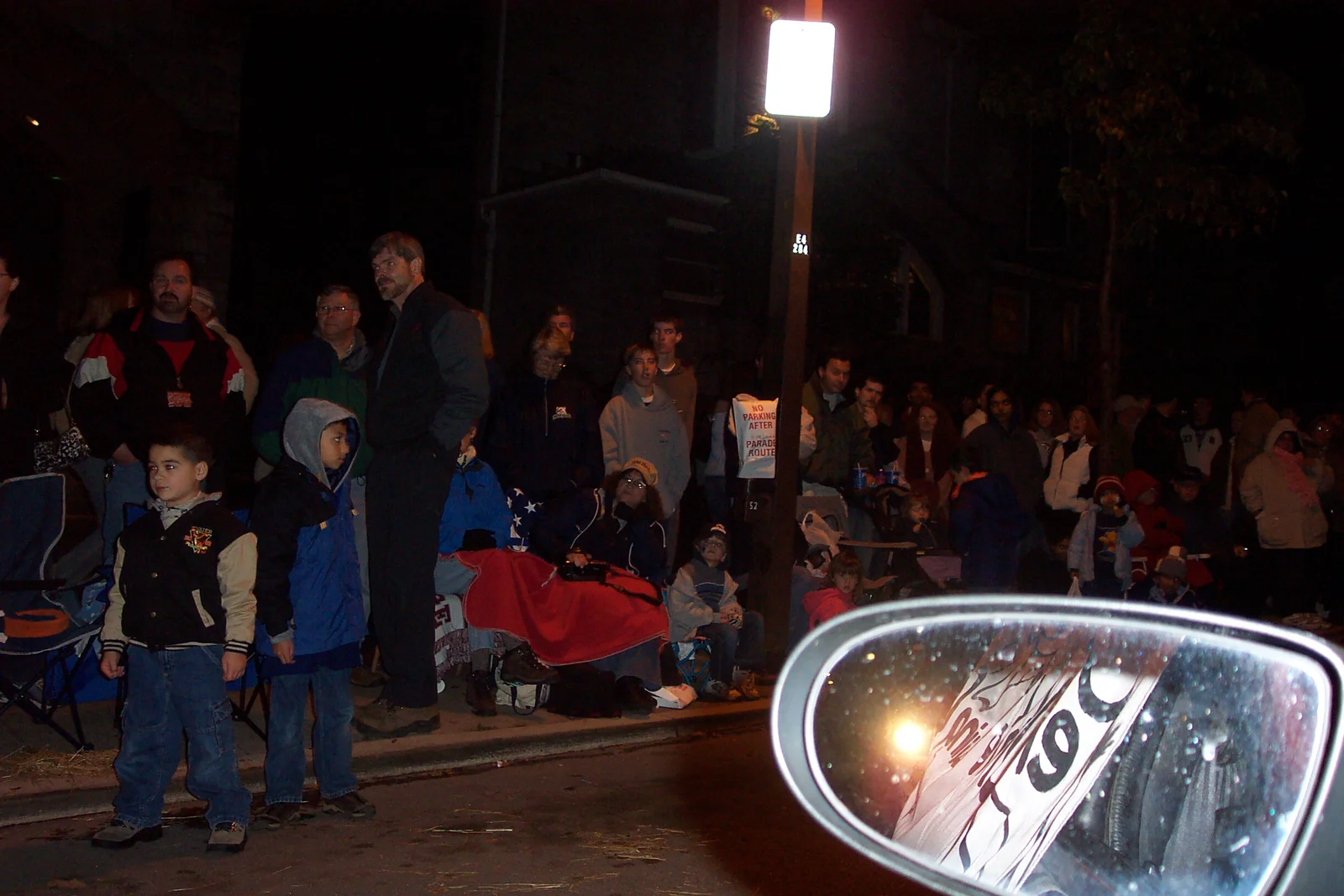 Throwing candy from floats was banned for the first time in 2004, so these children were disappointed that they received no treats.