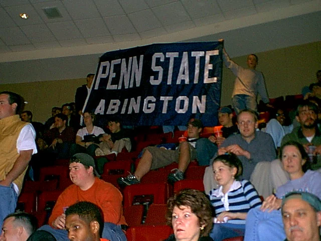 Steve Sokolowski and Mike Anzalone waved the banner at each stoppage of play. 