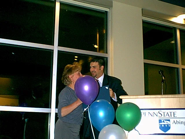 Marcia Delia and SGA President Drew Lavenberg share a goodbye. 