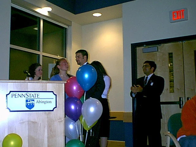 Another view of the award presentation to Drew Lavenberg. 