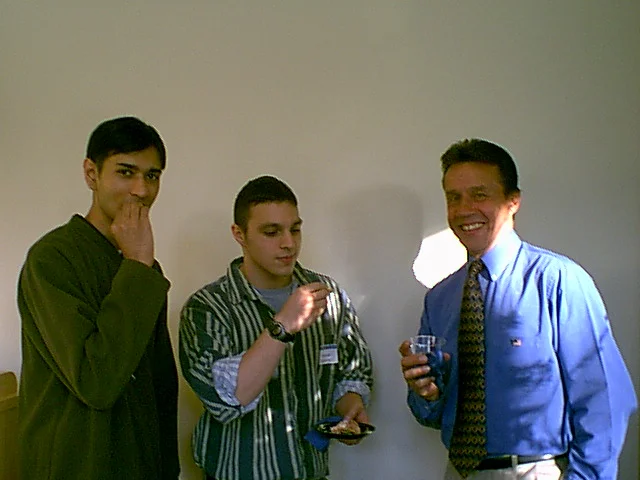 Krishna Mehta, Soroosh Hashemi, and Bob Barton enjoy the atmosphere before the start of the banquet. 