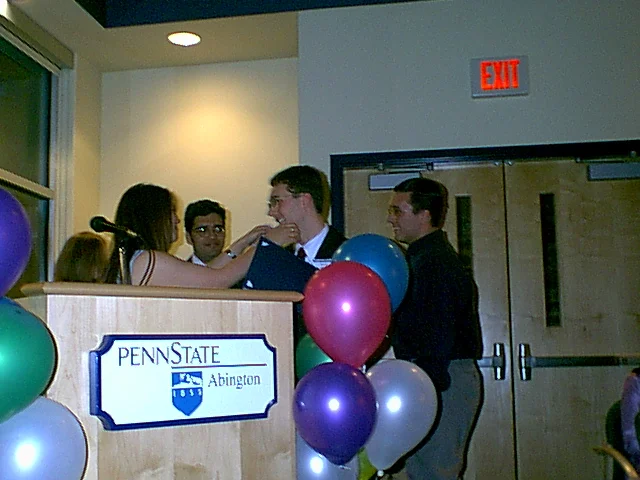 Laura Lindsey had the privilege of presenting for the Lion Ambassadors.  Here, Shawn and Scott Anderson receive Departing Leader awards. 