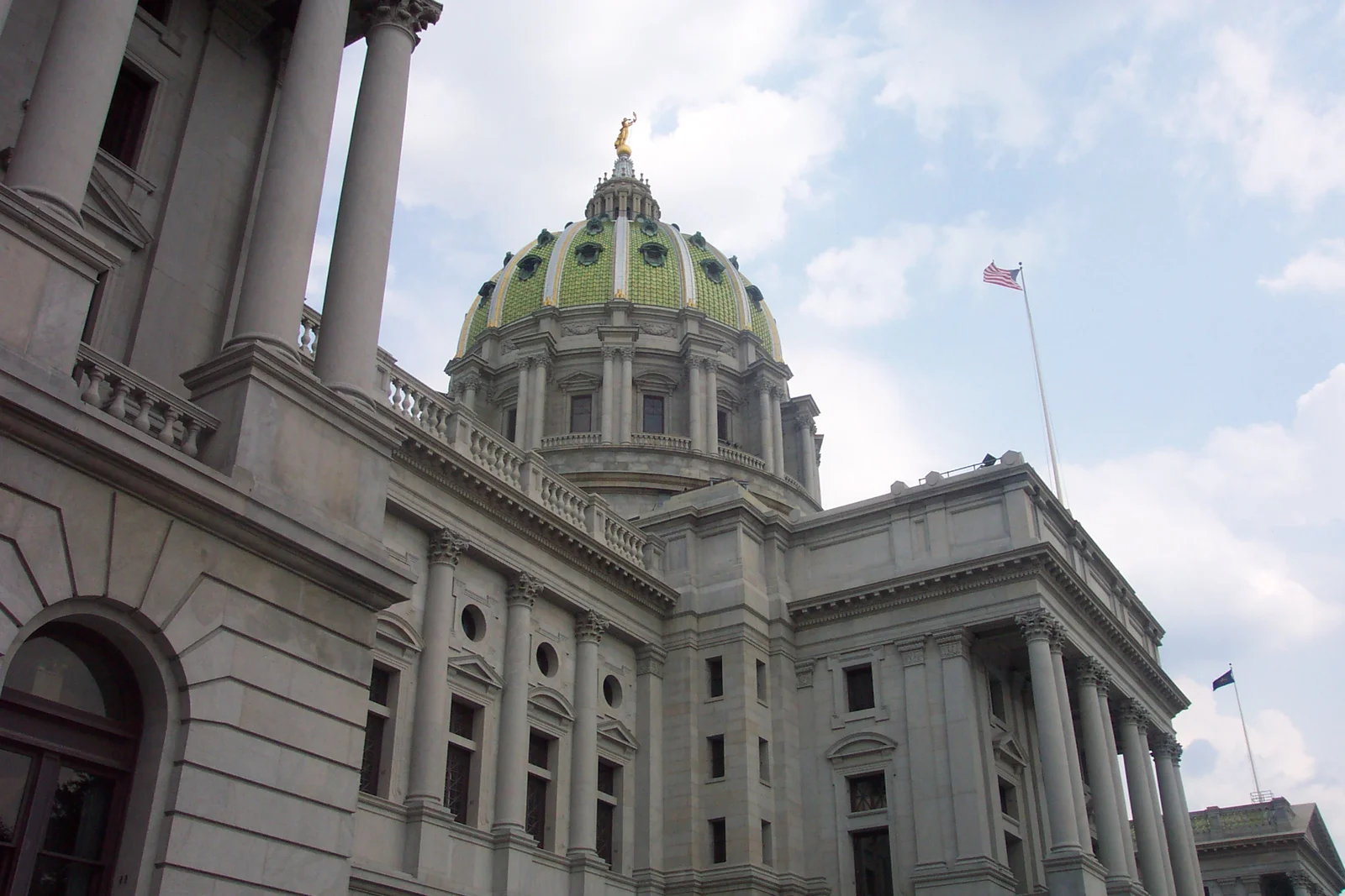 The capitol building, from the street in front of the building. 