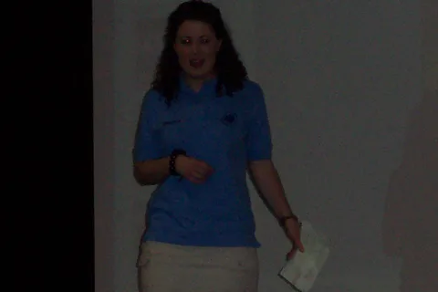 Regina Fetterolf, shown here, reads from a script written by Bridget Daly and Ashley Martin.