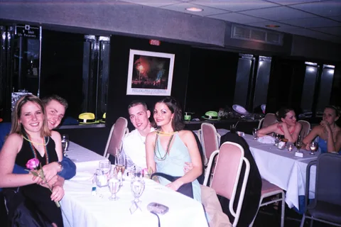 Another picture of some Abington students relaxing at a table. 