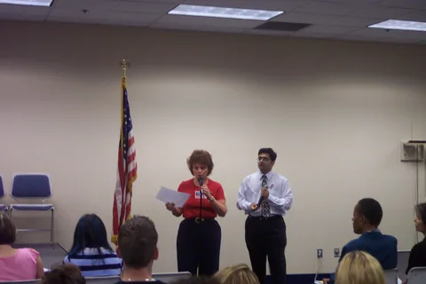 Director of Career Development Carol Debunda is shown speaking here, flanked by Ninad.