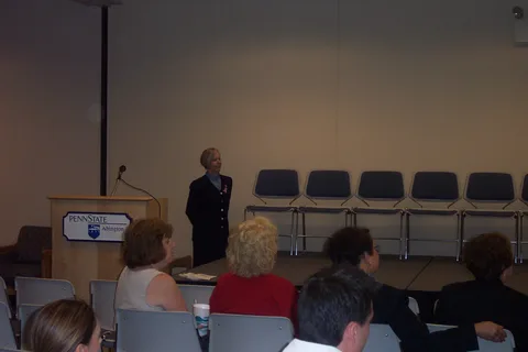 Dr. Sandler stands at the ready after the other speakers have finished.
