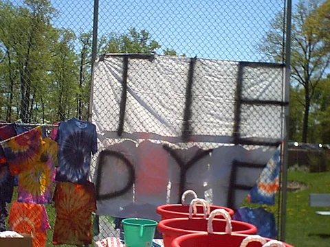 The tie dye sign was used not only in the 2002 Spring Fling, but also in the 2003 event.