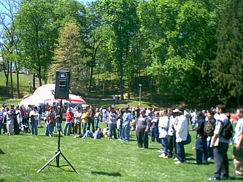 Students watched the band by forming a semicircle around the stage.