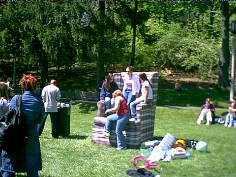 Photographs were taken of people sitting on the chair, making them appear tiny.