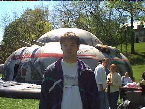 Stan poses in front of the laser tag arena after fighting inside.