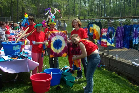(From left to right) Regina, Jenna, Doris, and Julia pose at the Tie-Dye booth.